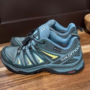 Women’s Salomon sneakers 
Black and green colored
Size 6.5